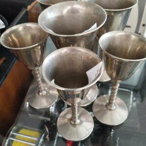 Six silver-plated goblets.